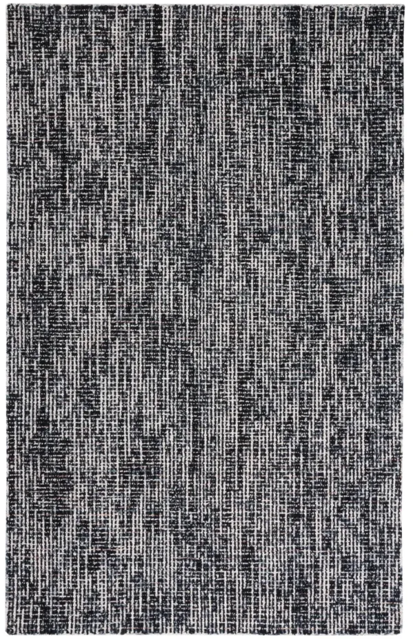 ABSTRACT Hand Tufted 2'-3' x 4' area rug