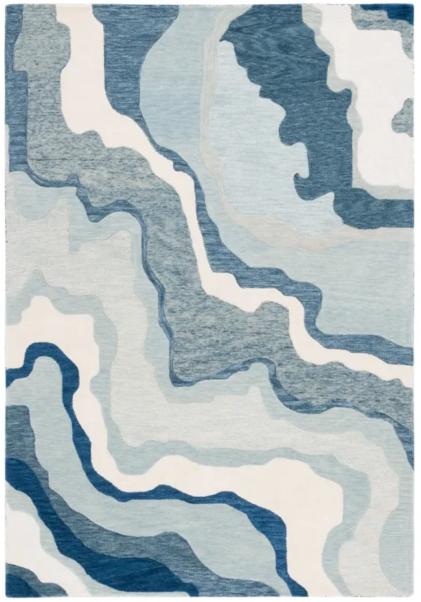 RODEO DRIVE Hand Tufted 5' x 8' area rug