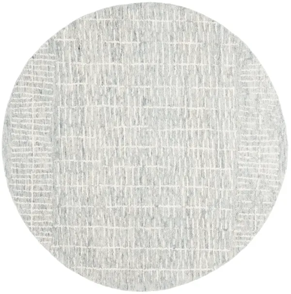 ABSTRACT Hand Tufted 6' x 6' Round area rug