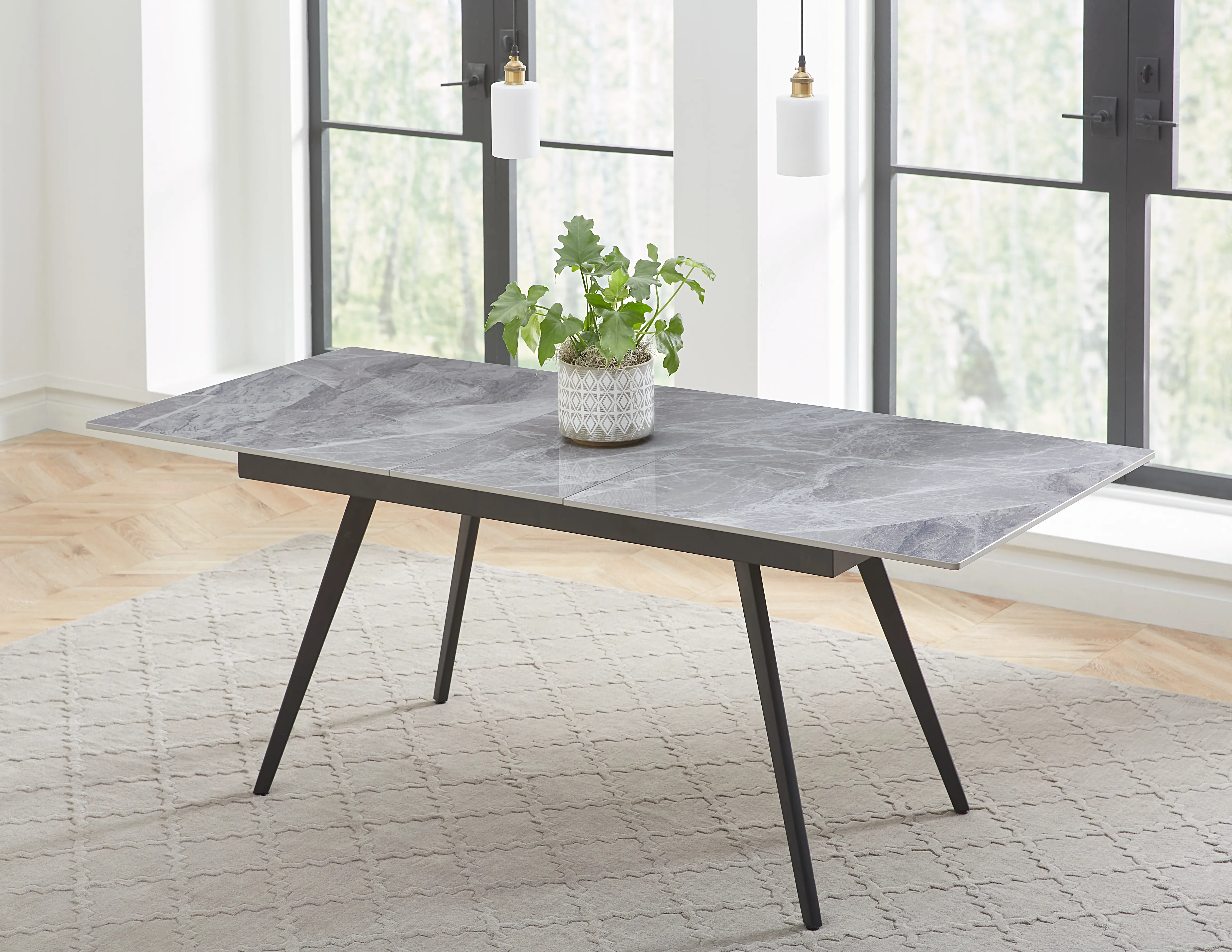 Lucia Extendable Stone Top Metal Leg Dining Table in Piedra and Black