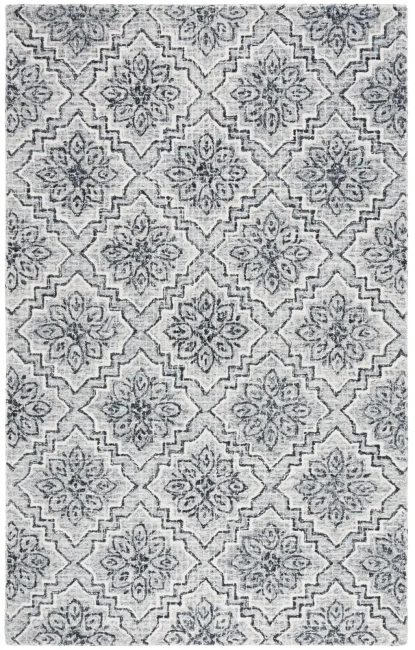 ABSTRACT Hand Tufted 4' x 6' area rug