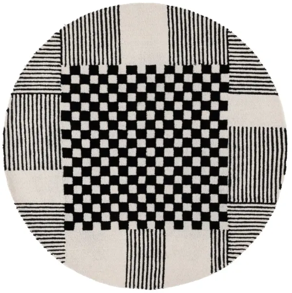 GENRE Hand Tufted 6' x 6' Round area rug