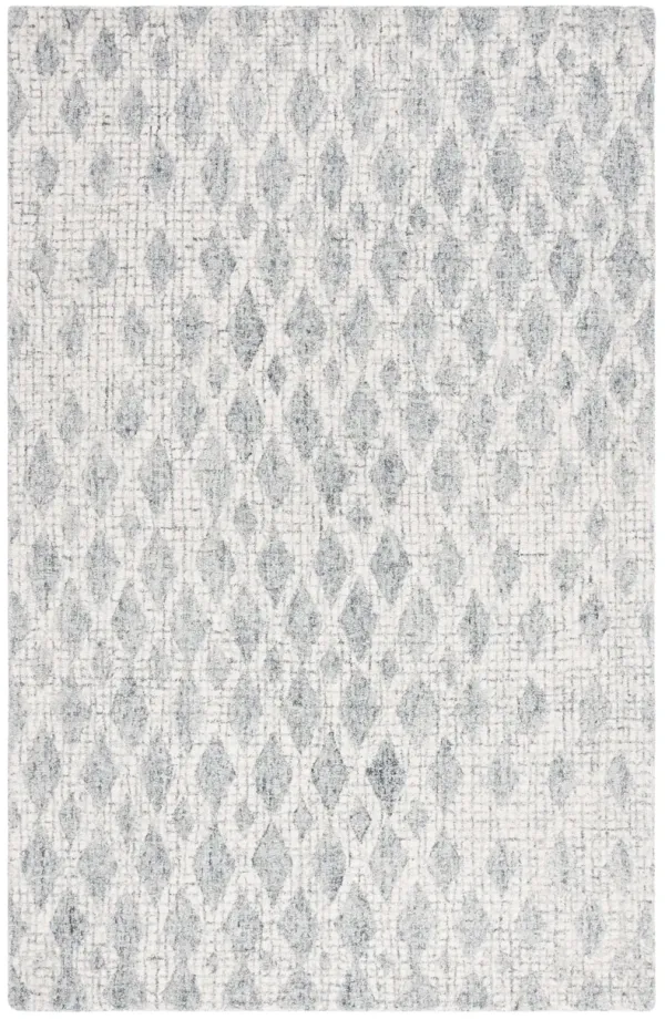ABSTRACT Hand Tufted 5' x 8' area rug