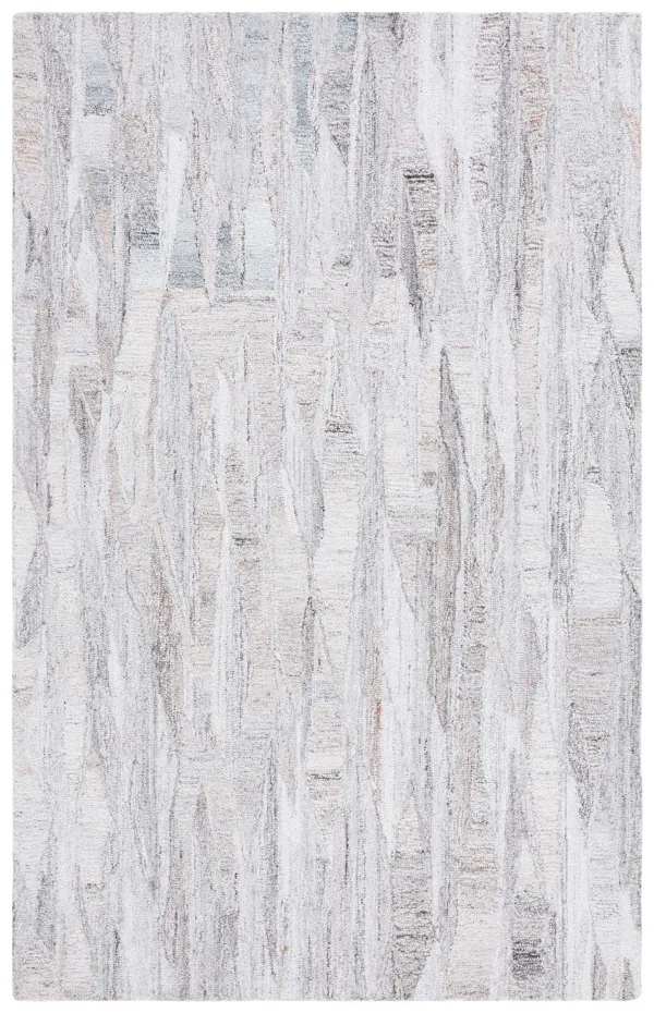 ABSTRACT Hand Tufted 6' x 9' area rug