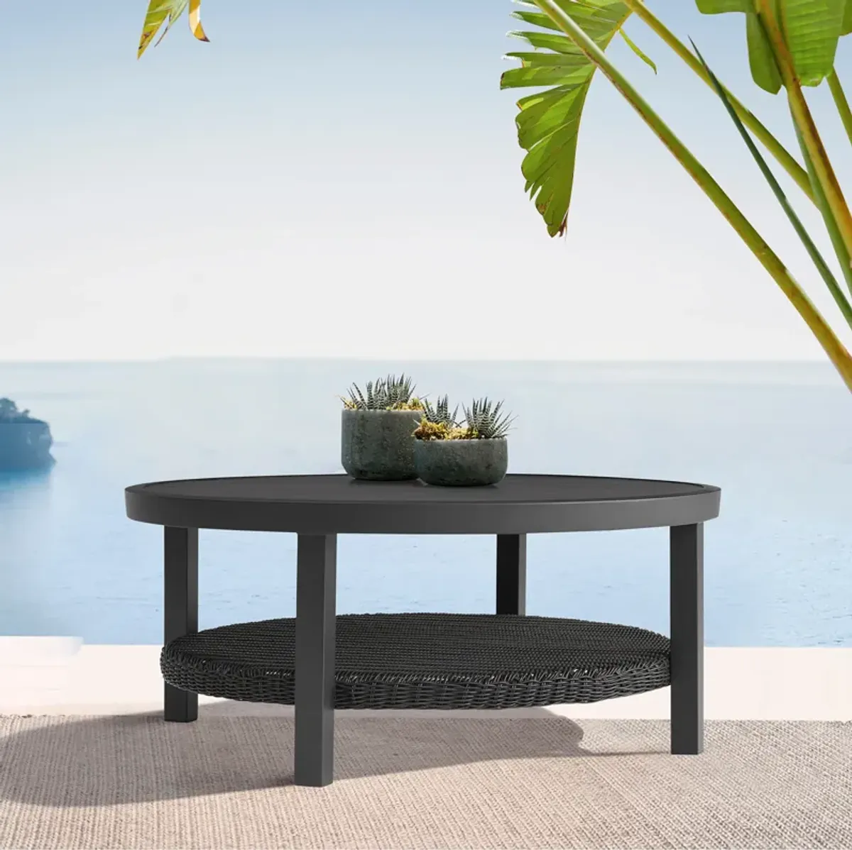 Cayman Black Aluminum Outdoor Round Conversation Table with Wicker Shelf