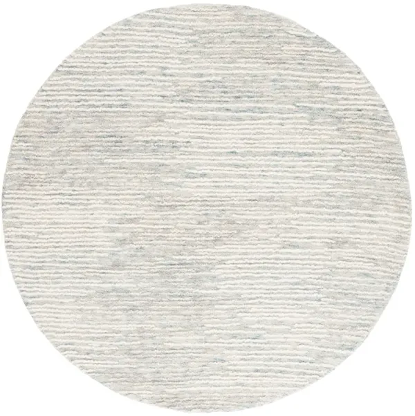 ABSTRACT Hand Tufted 6' x 6' Round area rug
