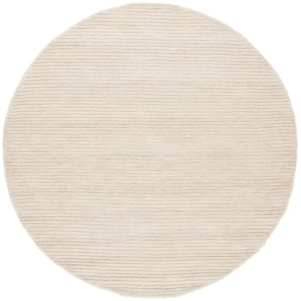 MIRAGE Hand Tufted 6' x 6' Round area rug