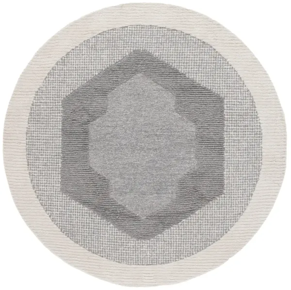 RENEWAL Hand Tufted 6' x 6' Round area rug