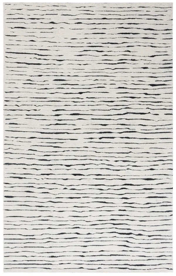 CASABLANCA Hand Tufted 4' x 6' area rug