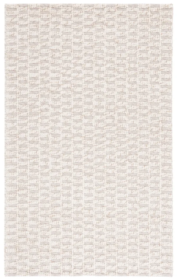 NATURA Hand loomed 4' x 6' area rug
