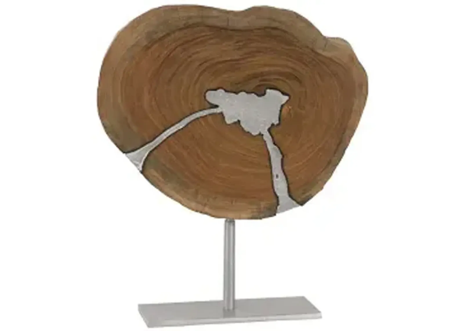 molten sculpture on stand, poured aluminum in wood