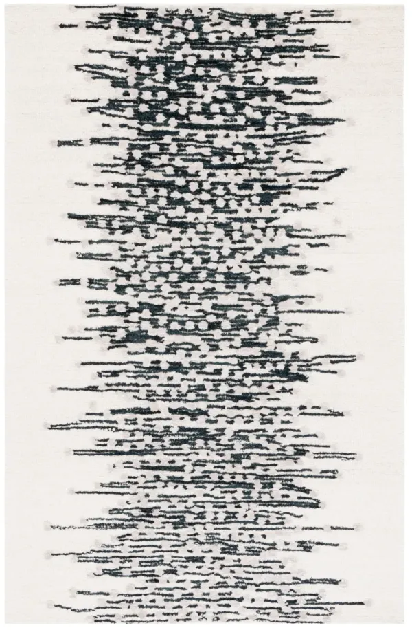 METRO Hand Tufted 5' x 8' area rug