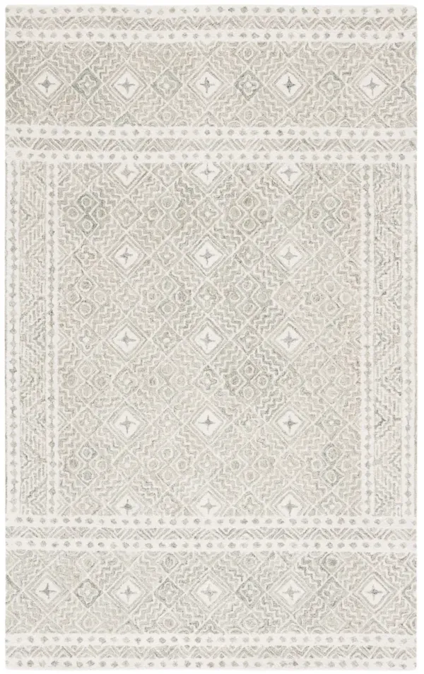 MICRO-LOOP Hand Tufted 4' x 6' area rug