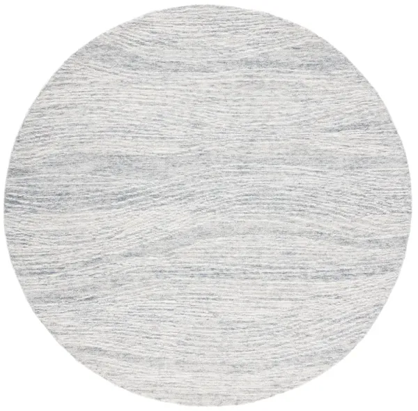 METRO Hand Tufted 4' x 4' Round area rug
