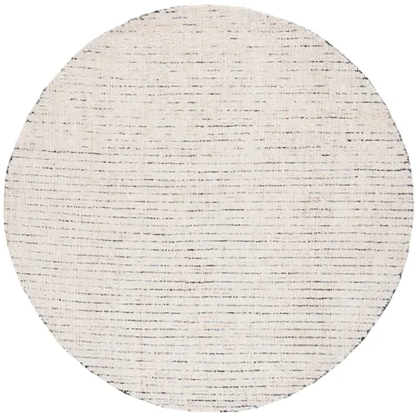 ABSTRACT Hand Tufted 4' x 4' Round area rug