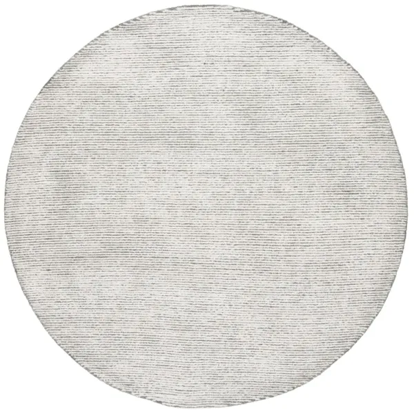 MIRAGE Hand Tufted 6' x 6' Round area rug