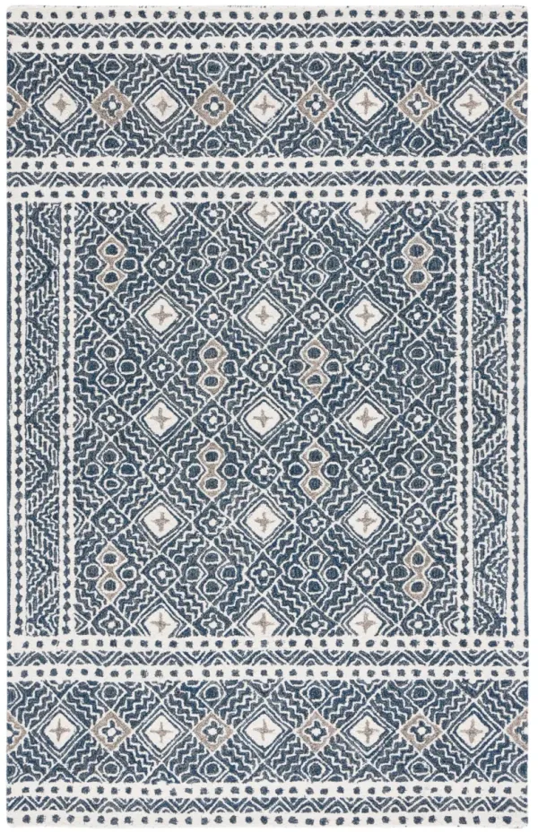 MICRO-LOOP Hand Tufted 5' x 8' area rug