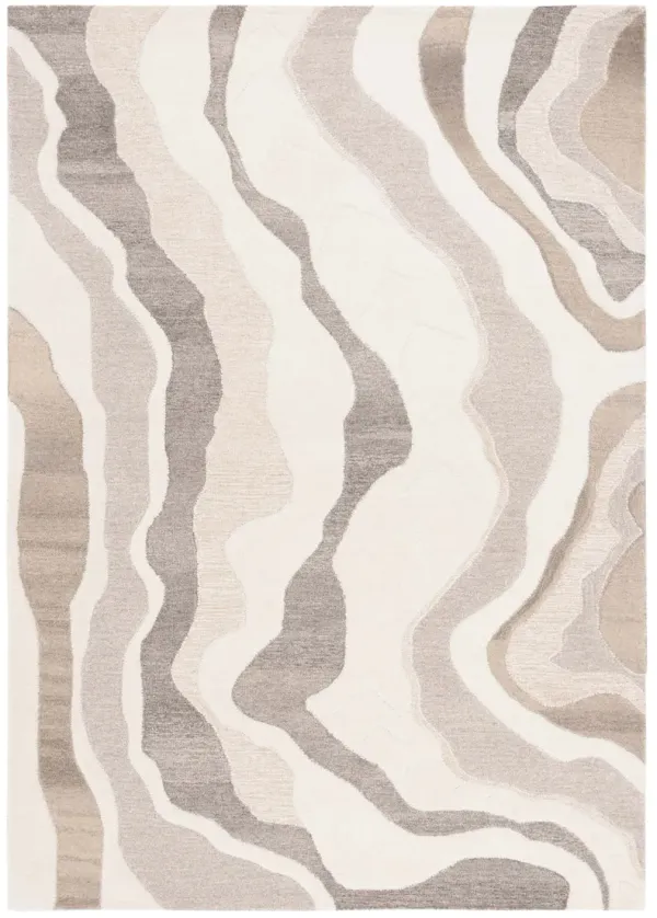 RODEO DRIVE Hand Tufted 5' x 8' area rug