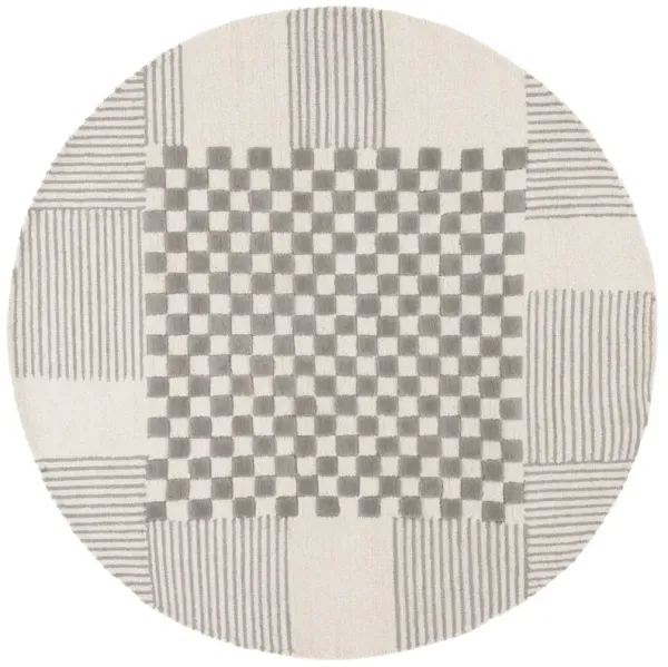 GENRE Hand Tufted 6' x 6' Round area rug