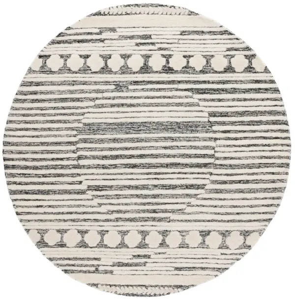 ABSTRACT Hand Tufted 6' x 6' Round area rug