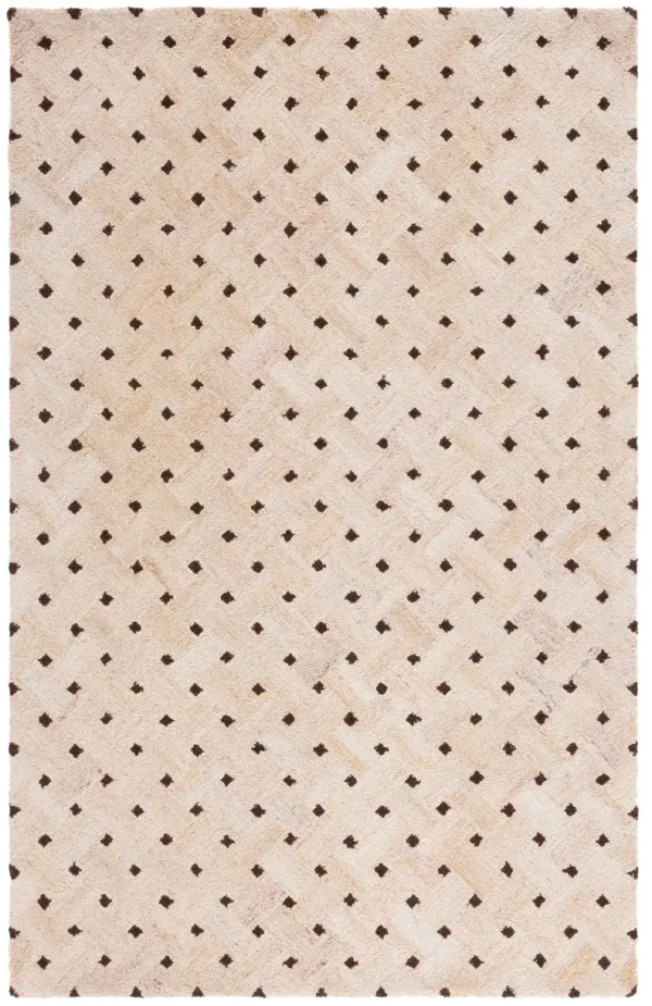 GENRE Hand Tufted 6' x 9' area rug