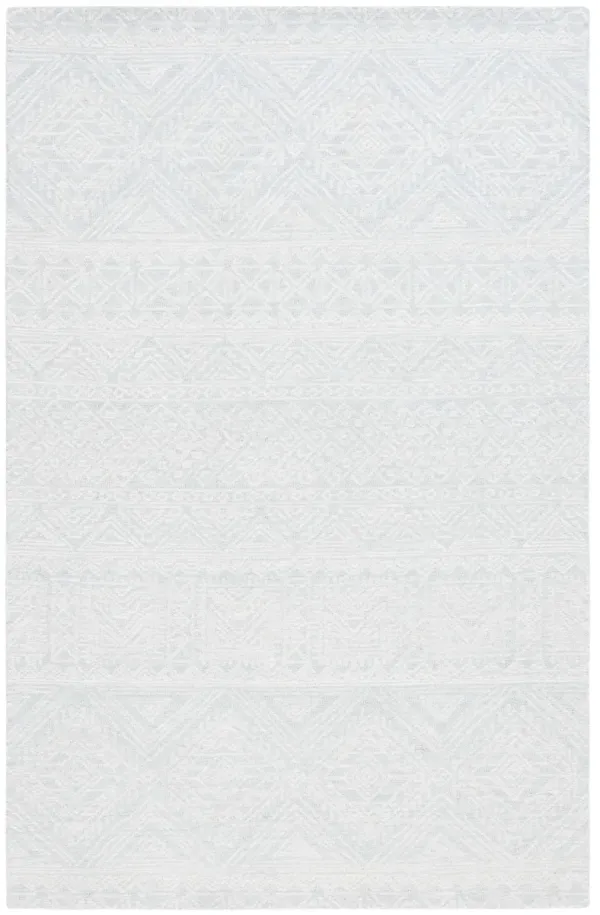 MICRO-LOOP Hand Tufted 3' x 5' area rug
