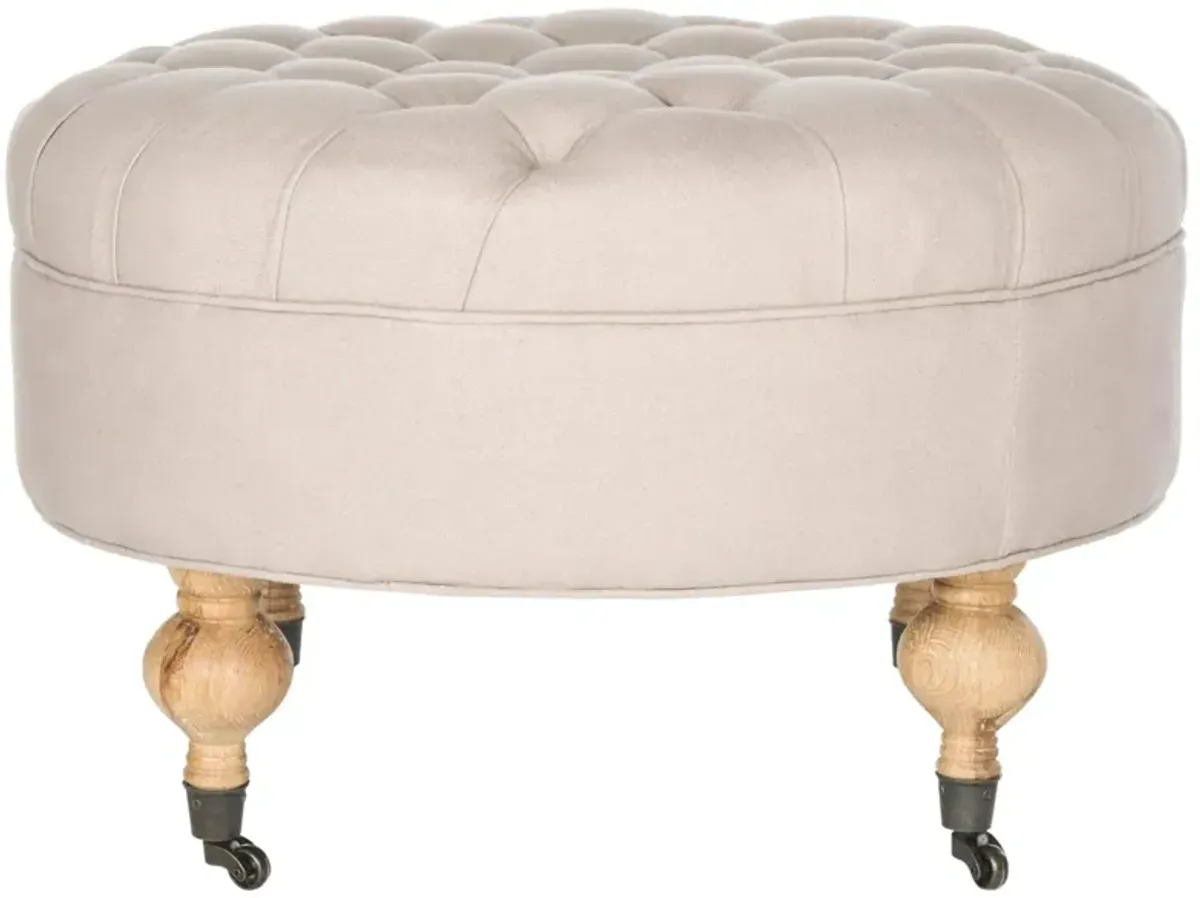 CLARA TUFTED ROUND OTTOMAN