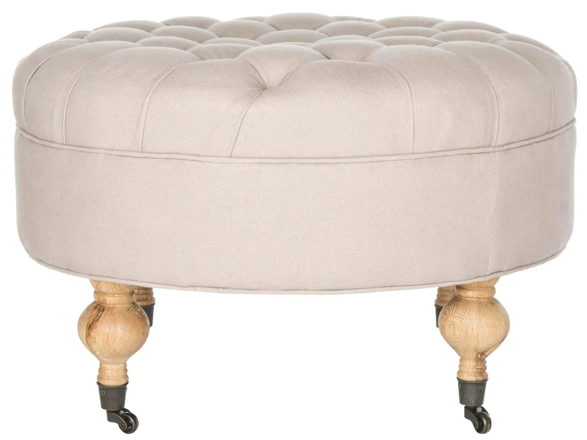 CLARA TUFTED ROUND OTTOMAN