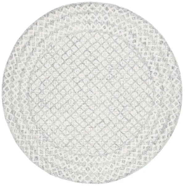 ABSTRACT Hand Tufted 6' x 6' Round area rug