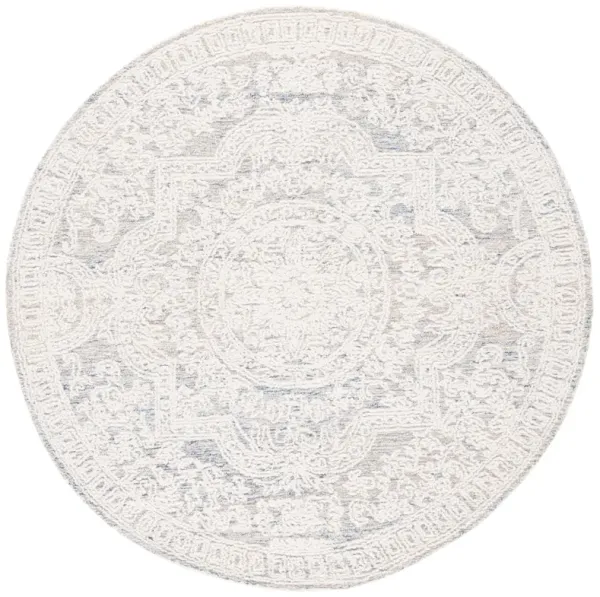 ABSTRACT Hand Tufted 6' x 6' Round area rug