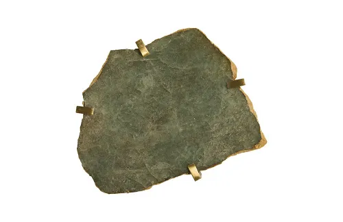 gem wall tile in brass setting, green emerald