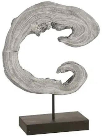 creature sculpture on stand, gray stone