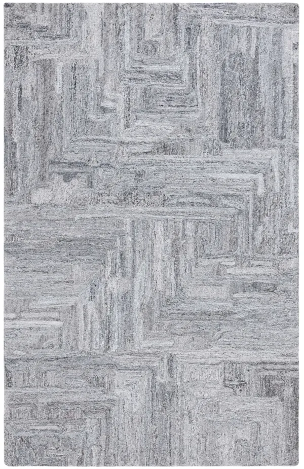 ABSTRACT Hand Tufted 6' x 9' area rug
