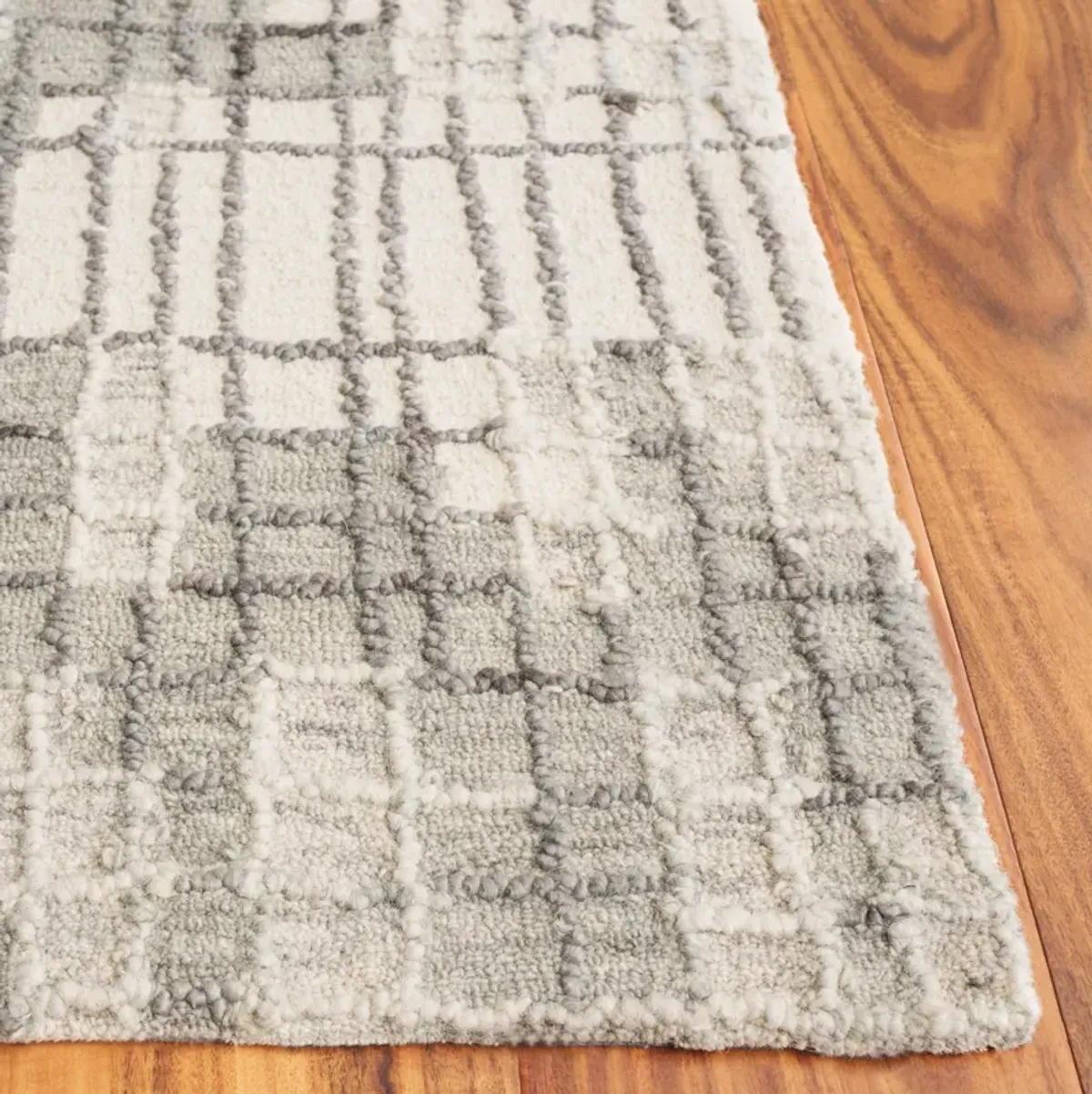 ABSTRACT Hand Tufted 6' x 9' area rug