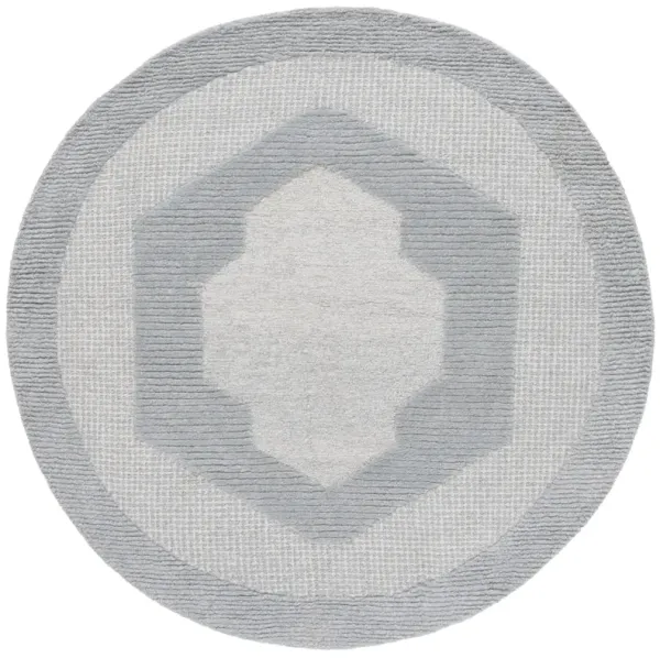 RENEWAL Hand Tufted 6' x 6' Round area rug