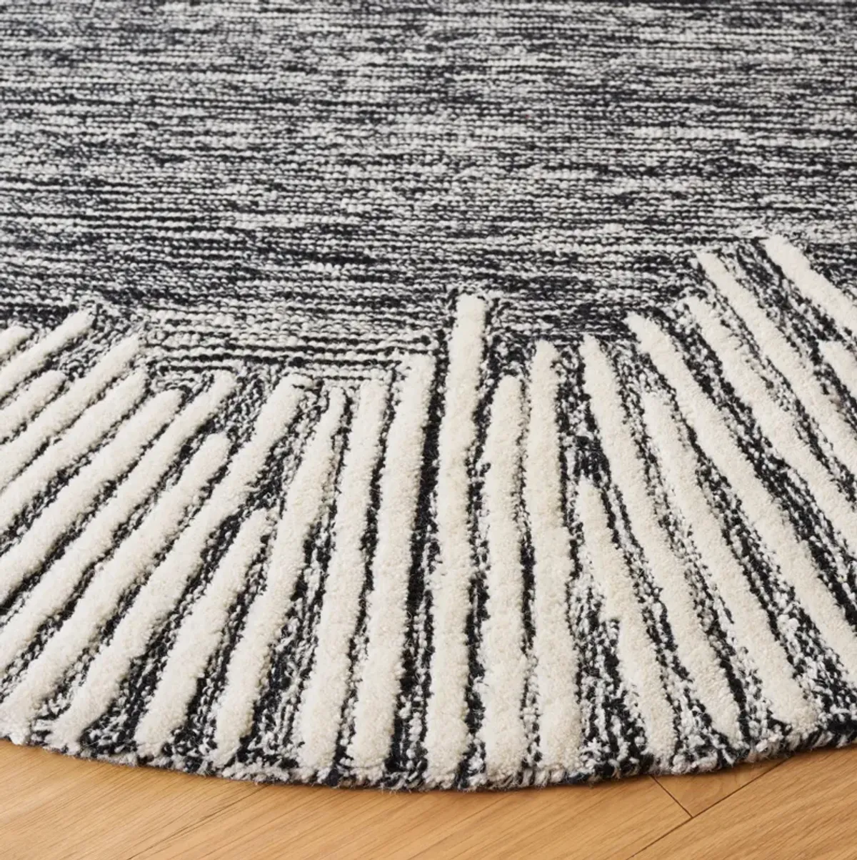 ABSTRACT Hand Tufted 4' x 4' Round area rug