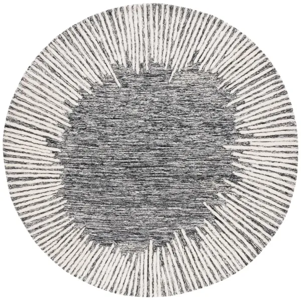 ABSTRACT Hand Tufted 4' x 4' Round area rug