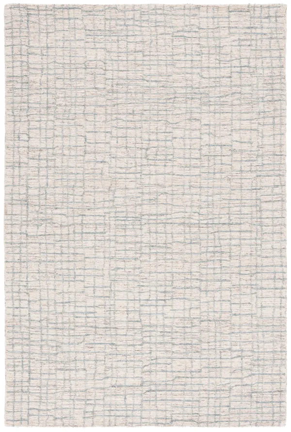 ABSTRACT Hand Tufted 6' x 9' area rug