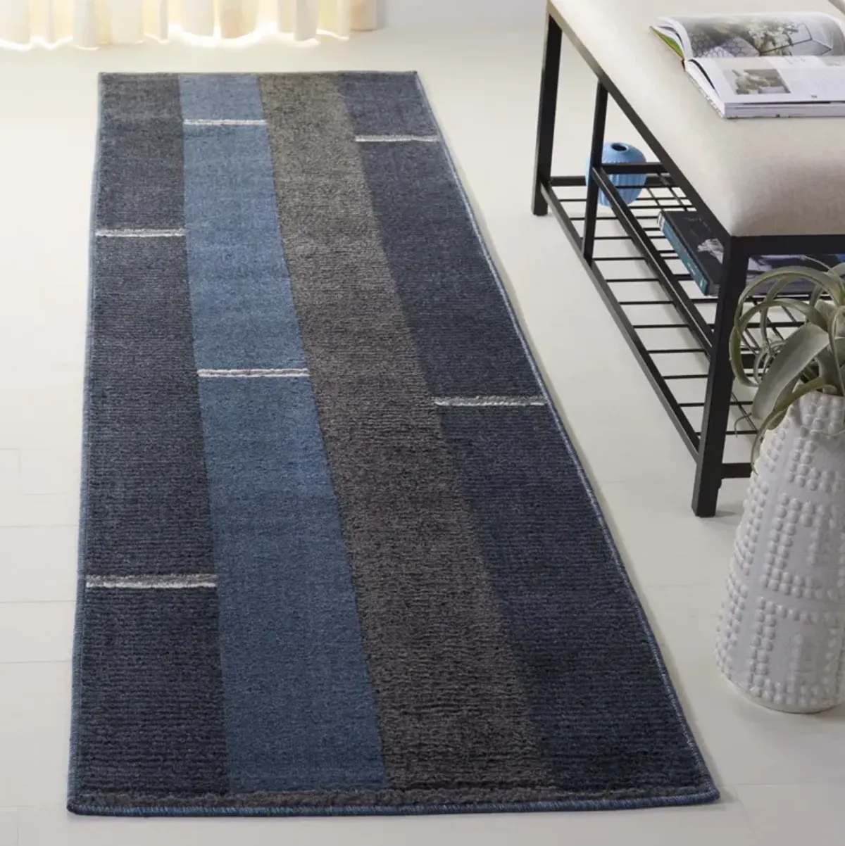 PYRAMID 234 NAVY  2'-2' x 8' Runner Rug