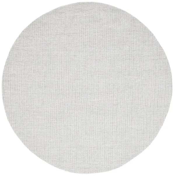 ABSTRACT Hand Tufted 4' x 4' Round area rug