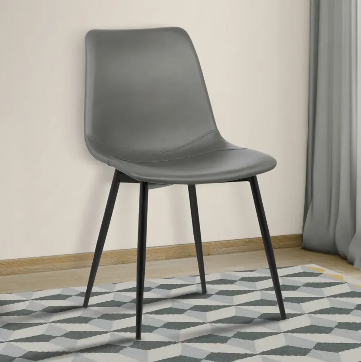 Monte Contemporary Dining Chair in Gray Faux Leather with Black Powder Coated Metal Legs