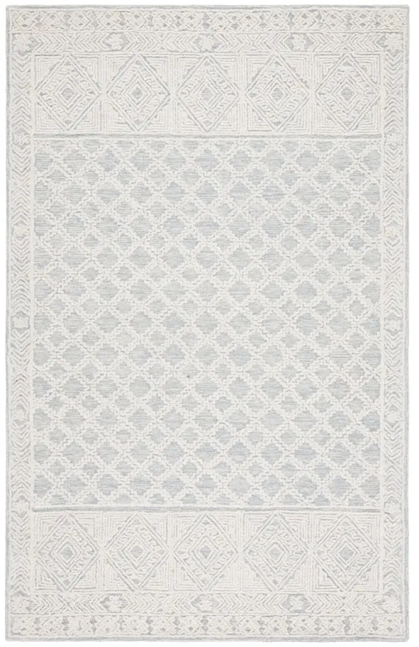 ABSTRACT Hand Tufted 6' x 9' area rug