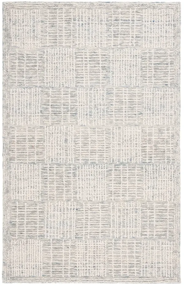 ABSTRACT Hand Tufted 5' x 8' area rug