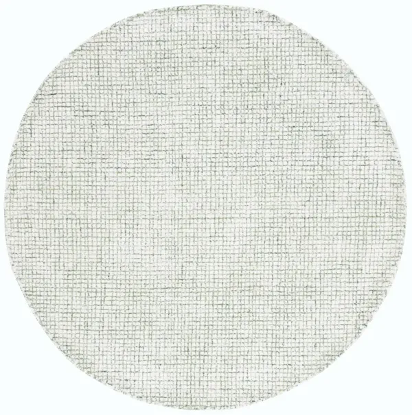 ABSTRACT Hand Tufted 4' x 4' Round area rug