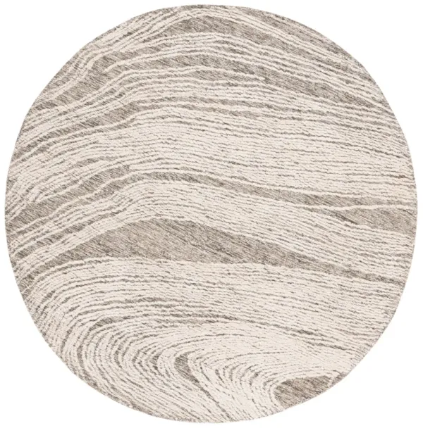 ABSTRACT Hand Tufted 4' x 4' Round area rug