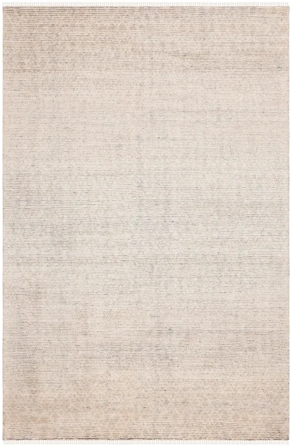 NOMAD Hand knotted 6' x 9' area rug