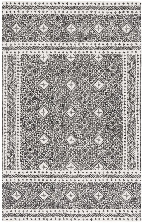 MICRO-LOOP Hand Tufted 4' x 6' area rug