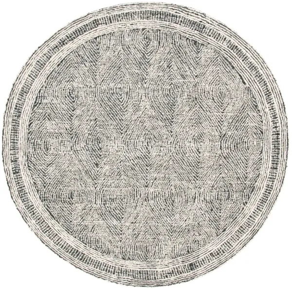 ABSTRACT Hand Tufted 10' x 10' Round area rug