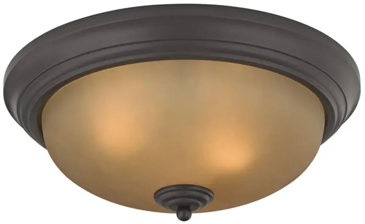 Huntington 3-Light Flush Mount in Oil Rubbed Bronze with Light Amber Glass