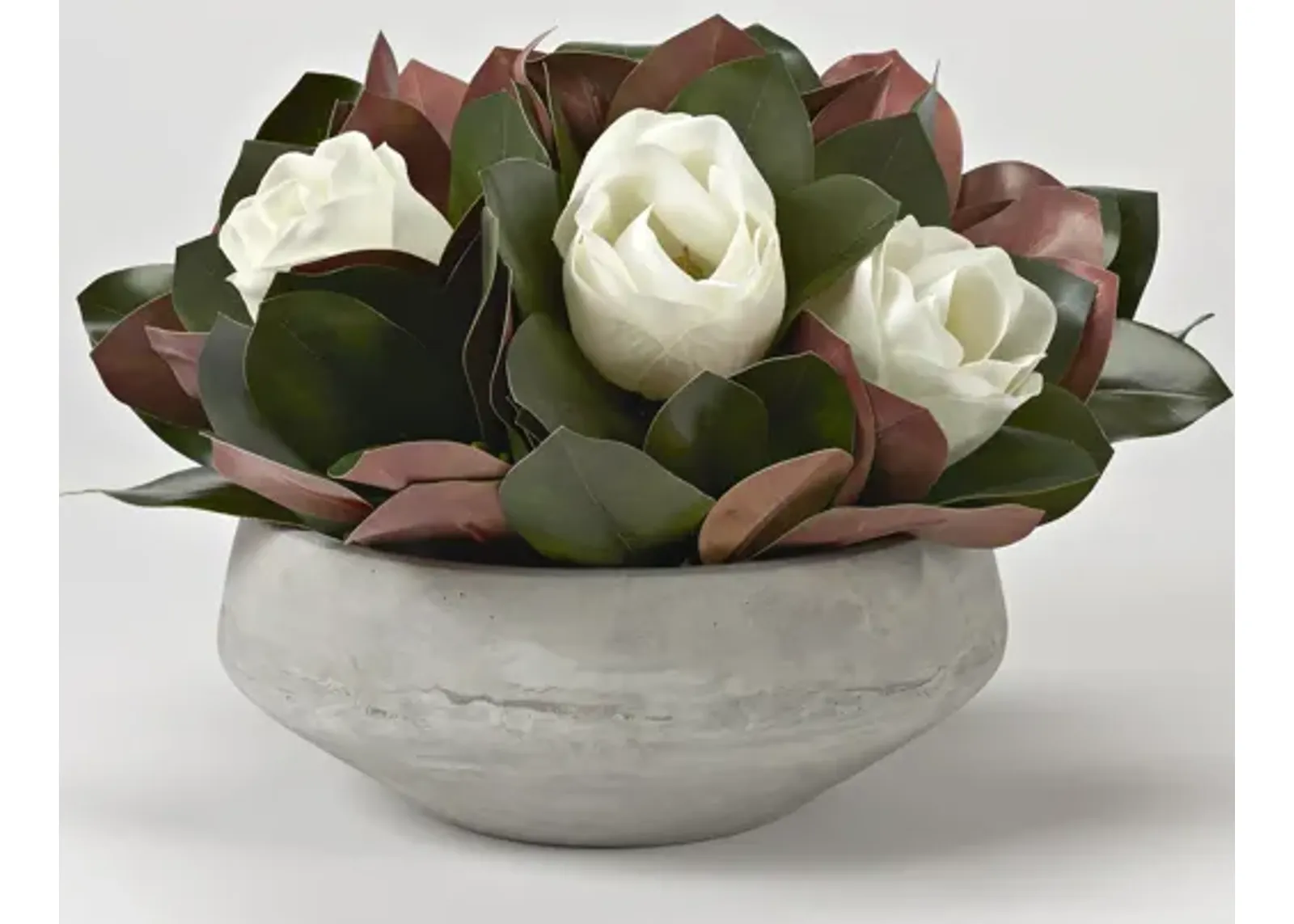 Magnolia Blooms And Leaves in Concrete Bowl